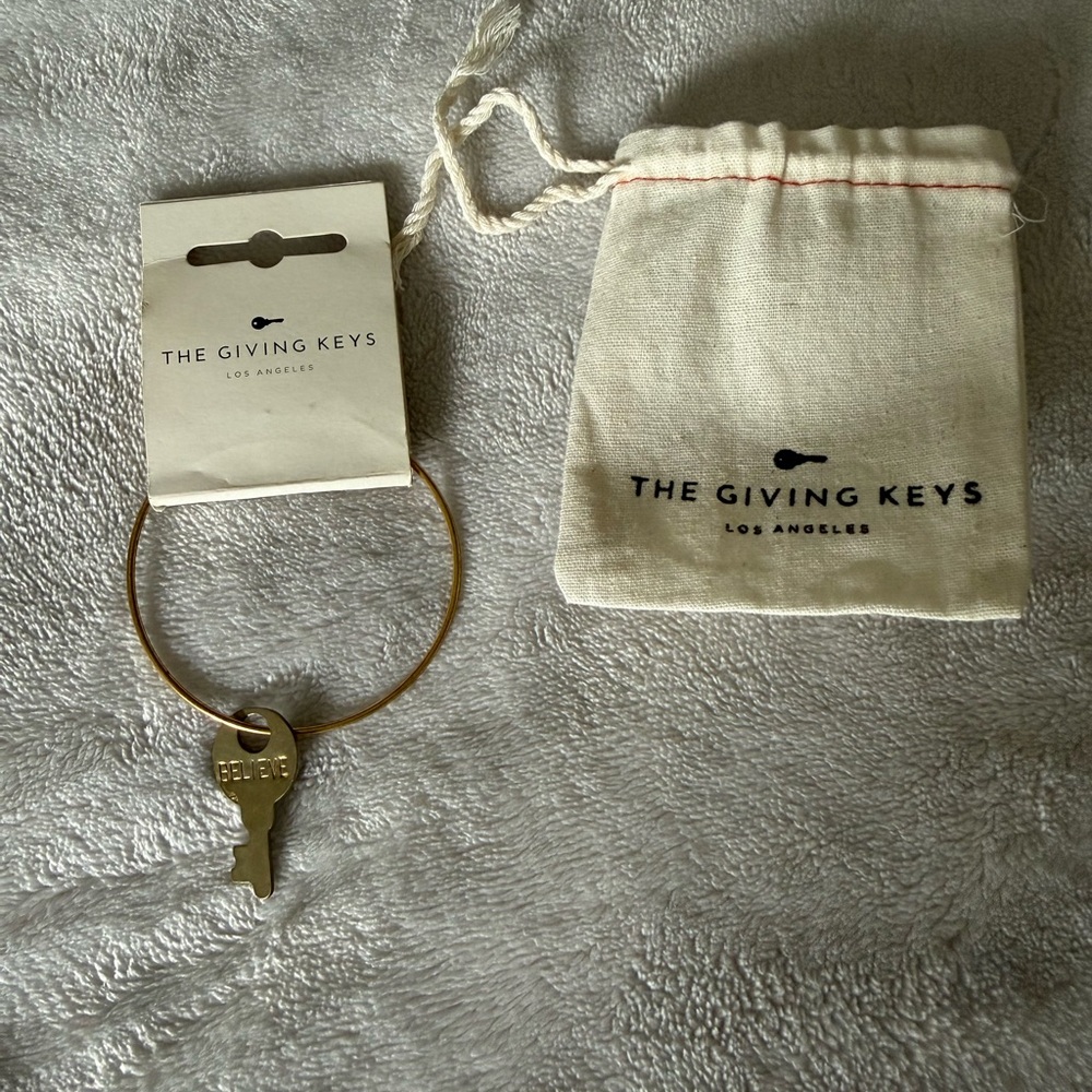 The Giving Keys Gold 'BELIEVE' Key Bangle Bracelet